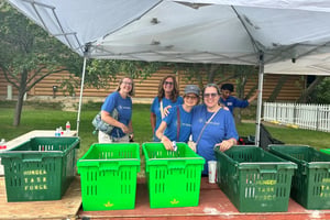 ORRM employees stand a booth